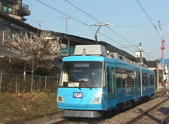 世田谷駅を後にする試運転中の302編成「東急TOPカード」／2000年3月10日 世田谷〜松陰神社前間